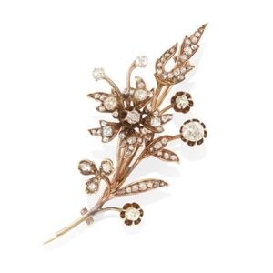 A LATE 19TH CENTURY GOLD AND DIAMOND BROOCH